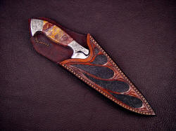"Malaka" sheathed view. Note sheath displays handle and bolsters nicely, yet protects cutting edge, blade, and point.