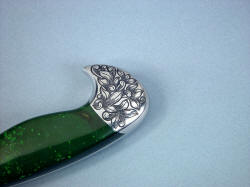 "Manaya" rear bolster engraving detail. Pattern is bold and strong. Green goldstone flanks handle tang