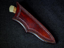 "Mirach" sheathed view. Sheath is deep and protective, with simple execution and clean lines