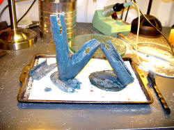 "Morta" carving wax models for casting into bronze knife stand