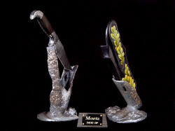 "Morta" knife sculpture. Stands are cast by lost wax process, without copies 