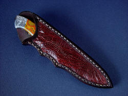 "Nekkar" sheathed view. Sheath is deep and protective, yet allows enough of the rear quillon to unsheathe knife with ease