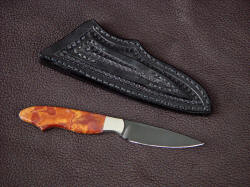 "Nihal" reverse side view. Lines of this small knife are clean and crisp, good contrast between the handle and blade