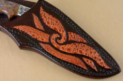 "Orion" sheath front detail. Frog skin is curious and textured, lacquered and sealed inlays matching engraving and blade leaf pattern