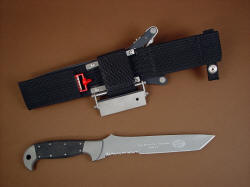 "PJ" fine handmade custom CSAR tactical knife, reverse side view showing custom engraving and locking sheath belt loop extender with accessories