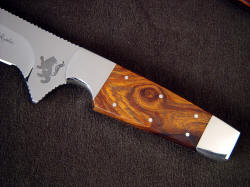 "Paraeagle" fine tactical, custom knife, obverse side handle detail. Handle is tough, hard Desert Ironwood, secured with full bedding and six stainless steel pins