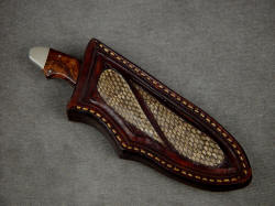 "Pluto" sheathed view. Sheath is protective and unique, with Rattlsnake skin inlays