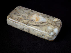 Polished and finished stone sarcophagus case for folding knife Procyon in brown Breccia Marble