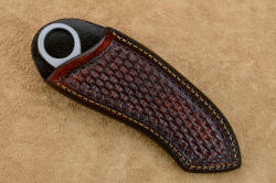 "Random Access Two" sheathed view, vertical sheath. This is a sheath for the left side wear, edge back, deep and protective, sealed for longevity, hand-stitched with polyester sinew