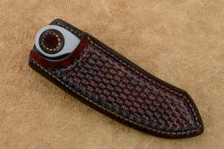 "Random Access Two" sheathed view, horizontal sheath. Knife is retained in sheath with leather stud, which has to be depressed in order for knife to be removed. Secure wear for middle of back or front side left.
