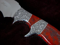 "Sargon" obverse side front and mid-bolster pair hand-engraving detail. This photo is about a four power enlargement of the knife, showing the detail