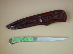 "Shaula" reverse side view. Teju lizard panels are full coverage, in and under the belt loop of the sheath
