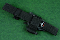 "Skeg" tactical, counterterrorism professional knife, UBLX belt loop extender, back side (against body). The mount for the small flashlight is stitched into the UBLX, as is the dedicated pocket for the DiaFold diamond sharpener 