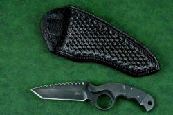 "Skeg" tactical, counterterrorism professional knife, shown with black basketweave 9-10 oz. thick leather sheath. Sheath is double-row stitched for extreme durability