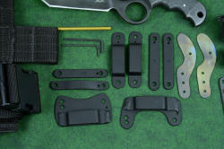 "Skeg" tactical, counterterrorism professional knife, complete set vignette of mounting hardware, springs, tools