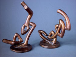 "Tharsis Intense" bronze lost wax cast forms for knife and sheath are individual works of sculpture