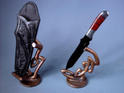 "Tharsis Intense" view from elevated position shows varied appearance of this sculptural form of knife, sheath, and art.