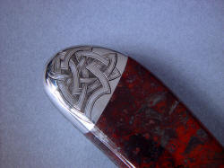 "Tharsis Intense" reverse side rear bolster engraving detail. Engraving has deep hatch relief  and is permanent