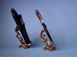 "Tharsis Intense" left side view showing sculpted solid bronze forms complimenting knife and sheath