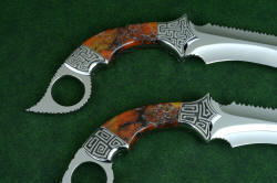 "Titan" karambits, fine handmade custom knives, reverse side view. Karambits are beautiful studies in form and shape