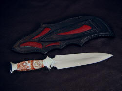 "Troll Magnum" reverse side view. Note inlays on sheath back, nice lines of hollow ground dagger blade.