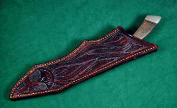 "The Veteran" sheathed view. Sheathe is hand-carved leather shoulder, hand-stitched, dyed, lacquered and sealed