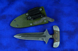 "Vindicator" tactical counterterrorism push/punch dagger, obverse side view in "Shadow" line ATS-34 high molybdenum stainless steel blade, 304 stainless steel bolsters, black/gold G10 fiberglass/epoxy laminate composite handle, hybrid tension-locking sheaths in Coyote and Olive drab, heavy duty leather double-tab stainless snap locking leather sheath in bison-dyed basketweave leather