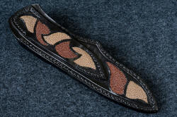 "Vulpecula" sheath back view. Inlays of brown and tan rayskin are in belt loop and sheath back, stitched with heavy polyester for strength