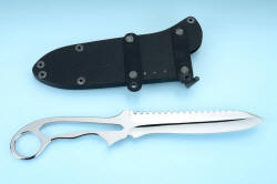 "Xanthid" tactical/working dive knife, reverse side view with sheath shown with flat strap clamps, horizontal wear position. These anodized aluminum straps clamp rigidly to the belt or PALS or body armor or gear