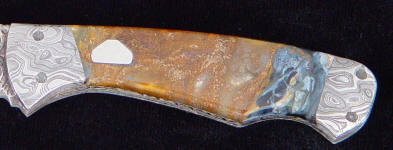 Piedersite Agate from Namibia, Africa has irregular brecciated masses of fibers