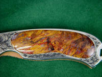 Pietersite Agate inlaid in interframe folding knife with stainless steel hand-engraved liners