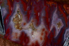 Sonoran Flame agate in a 6 power magnification is stunning, hard and takes a bright, glassy polish