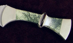 Nephrite Jade's toughness is due to interlocking microscopic fibrous crystals