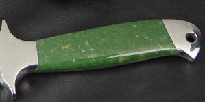 Siberian Jade is tough enough for use on this combat grade knife handle