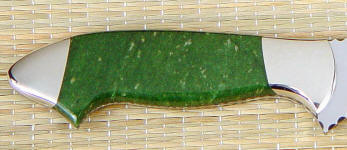 Siberian Jade gemstone custom knife handle on a skinning knife