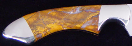 Polvadera Jasper is brecciated, that is broken up, then reformed under tremendous heat and pressure beneath the earth