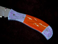 Red River Jasper is very tough and hard, suitable for this folding knife handle scale