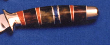 Petrifed wood, lapis lazuli, catlinite gemstone with bloodwood hidden tang knife handle