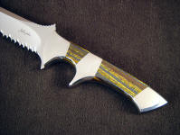 Australian Tiger Iron gemstone on a tactical combat knife with stainless steel fittings