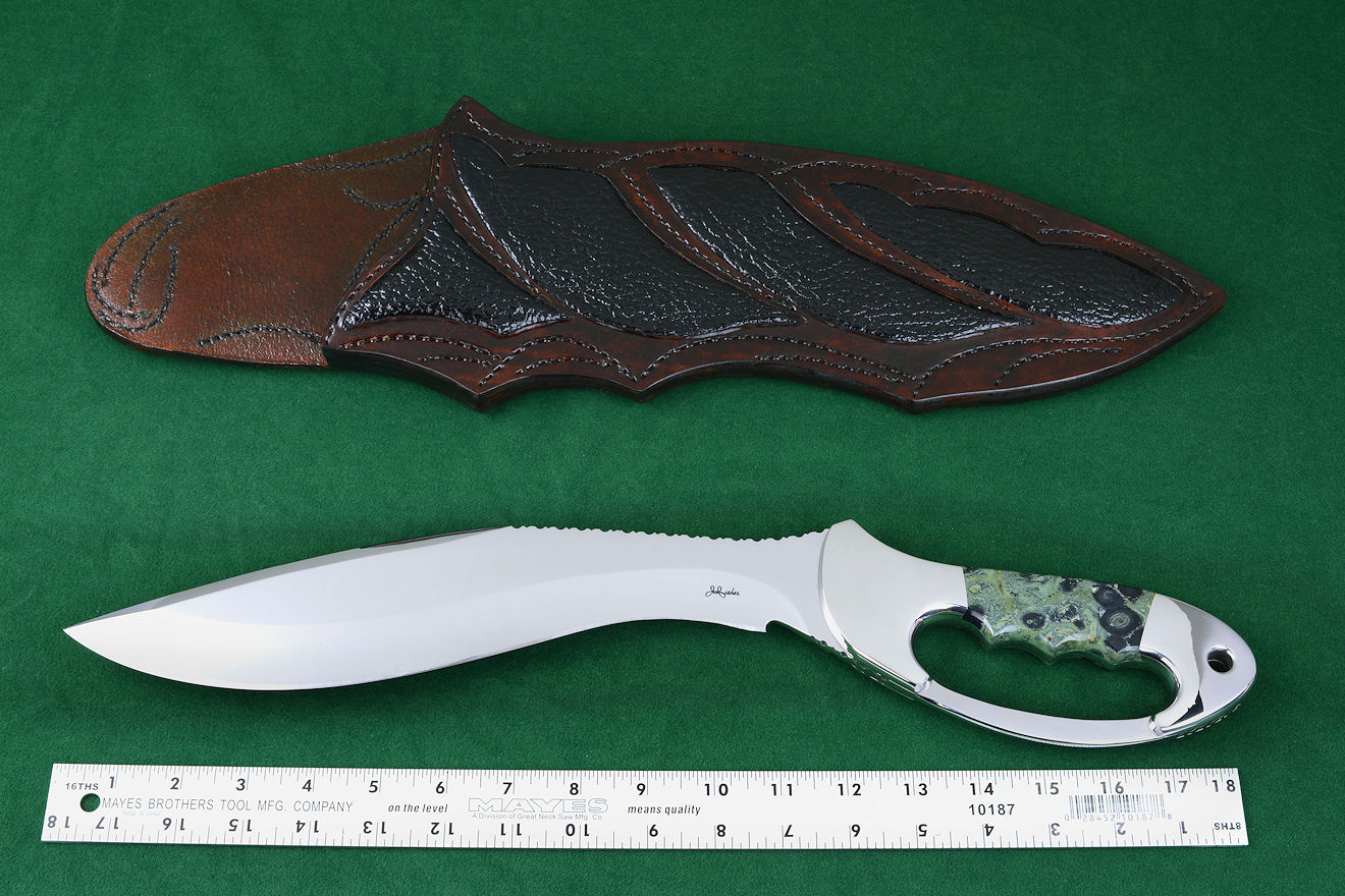 "Ananke" fine custom handmade knife, obverse side view in ATS-34 high molybdenum stainless steel blade, 304 stainless steel bolsters, Kambaba Jasper gemstone handle, hand-carved leather sheath inlaid with buffalo skin