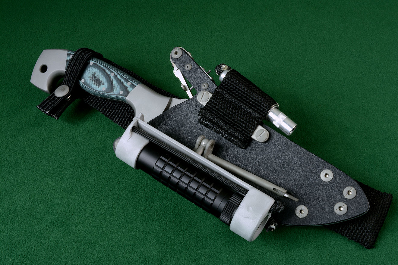 The HULA with a MagTac flashlight on this "Arctica" tactical combat, rescue, survival knife.