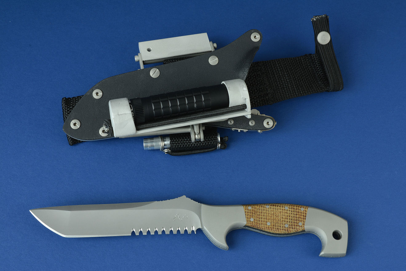 "Arctica" tactical, combat, rescue, survival knife, obverse side view in CPMS30V high vanadium powder metal technology tool steel blade, 304 stainless steel bolsters, Thunderstorm kevlar with brass handle, locking kydex, aluminum, stainless steel sheath with ultimate belt loop extender and all accessories