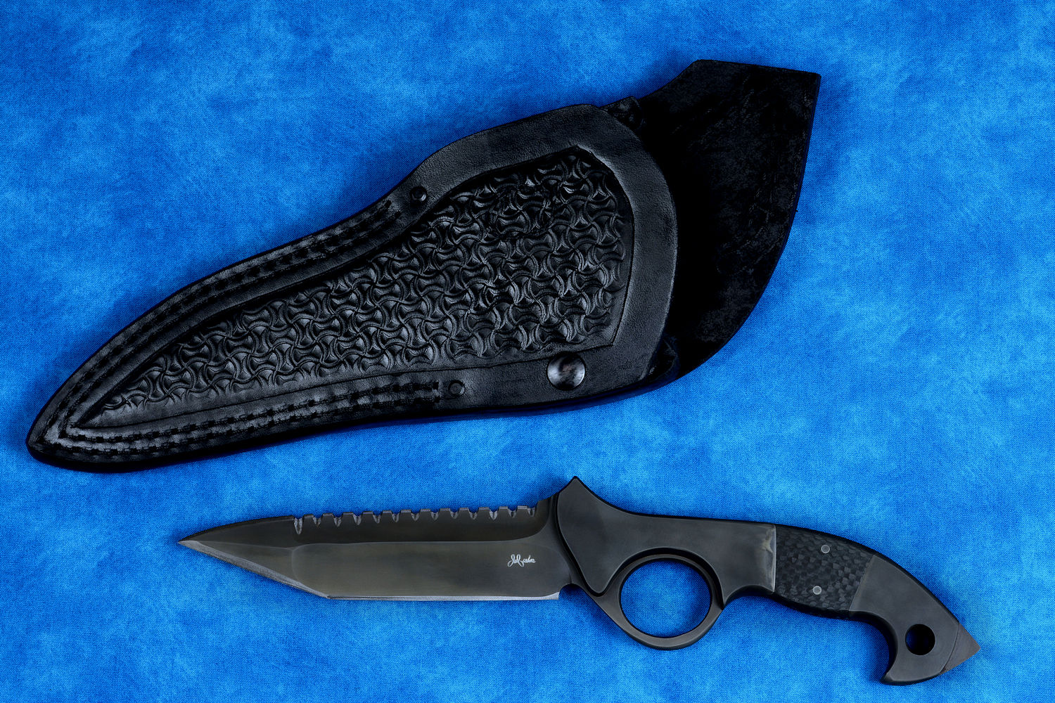 "Ari B'Lilah" counterterrorism, tactical, combat knife, obverse side view in T4 cryogenically treated 440C high chromium martensitic stainless steel blade, 304 stainless steel bolsters, carbon fiber handle, hybrid tension tab locking sheath in kydex, anodized aluminum, anodized titanium, black oxide stainless steel