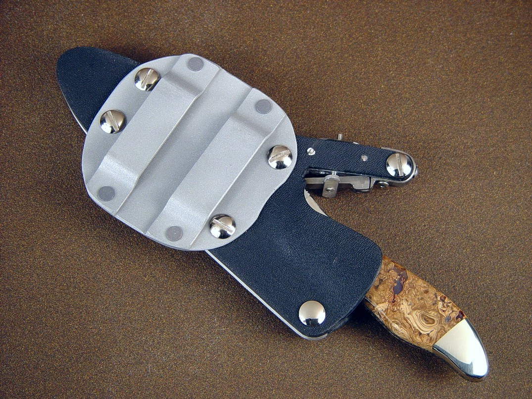 "Calisto" custom handmade knife, obverse side view, 440C stainless steel blade, nickel silver bolsters, Fossilized Cretaceous Algae gemstone handle, locking kydex, aluminum, stainless steel sheath