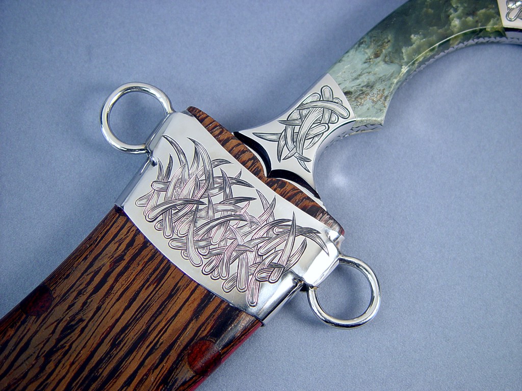 Hand-engraved, handmade stainless steel components, chape detail in 304 stainless steel in "Desert Wind" Persian dagger at Sharp Instinct Studio