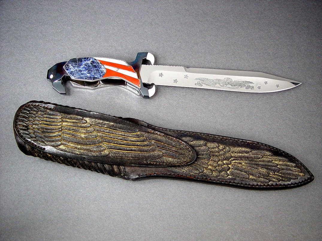 "Freedom's Promise" reverse side view in hand-engraved 440C high chromium stainless steel blade, blued steel guard and pommel, ivory, opals, sodalite, jasper, quartz, crocidolite handle, hand-carved leather sheath with gold wash