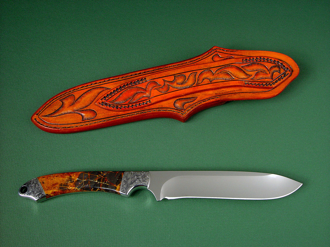 "Magdalena Magnum" reverse side view in D2 extremely high carbon die steel blade, hand-engraved 304 stainless steel bolsters, Pilbara Picasso Jasper gemstone handle, hand-carved, hand-tooled leather sheat