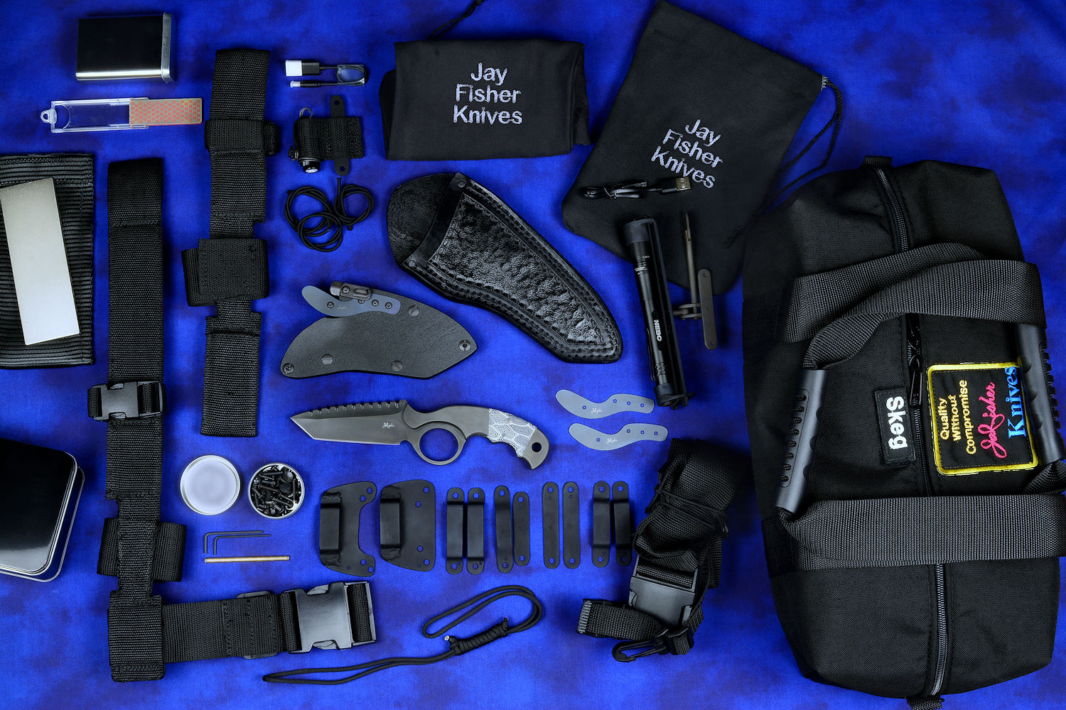 "Skeg" tactical knife kit, complete, with UBLX, EXBLX, HULA, LIMA, diamond sharpener, leather sheath, sternum harness, lanyards, staps, clamps, hardware, and heavy ballistic nylon duffle