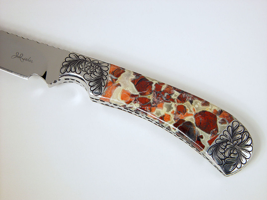 "Trifid" obverse side view in 440C high chromium stainless steel blade, hand-engraved 304 stainless steel bolsters, Brecciated Jasper gemstone handle, Ostrich leg skin inlaid in hand-carved leather sheath