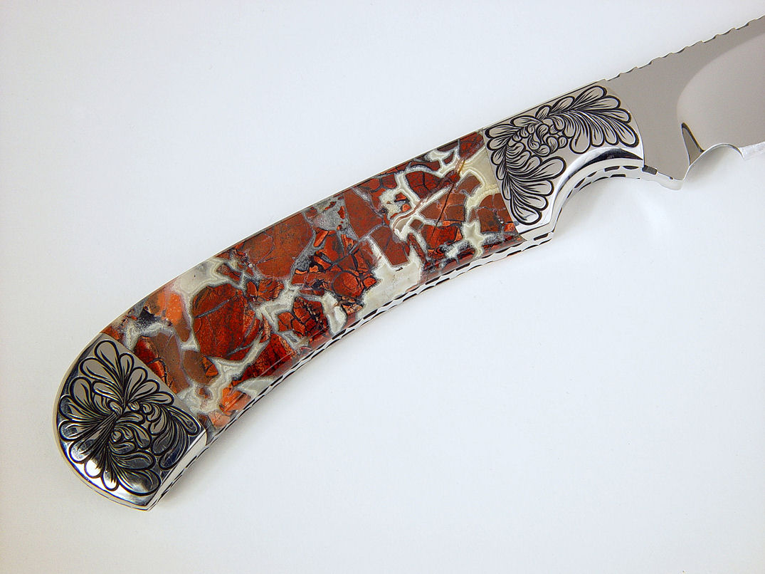 "Trifid" reverse side view in 440C high chromium stainless steel blade, hand-engraved 304 stainless steel bolsters, Brecciated Jasper gemstone handle, Ostrich leg skin inlaid in hand-carved leather sheath